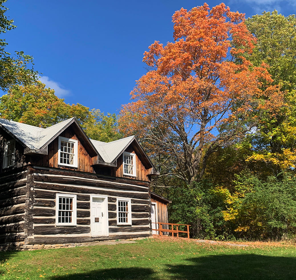 log house at mill pond